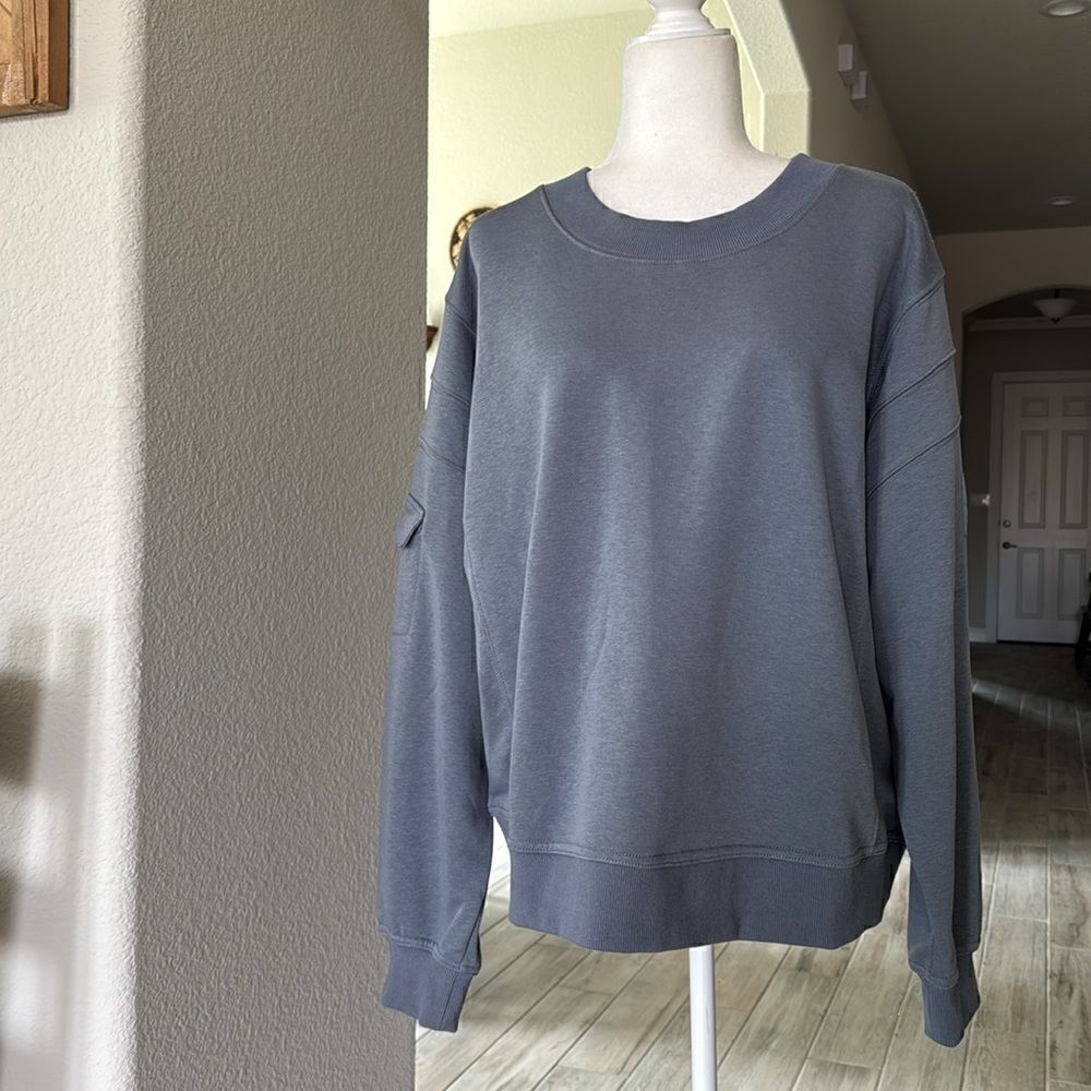 NWOT Free People Crew Neck Sweatshirt Sleeve Pocket Blue Oversized Movement Gym